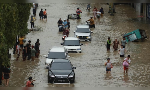 Indonesia flood death toll climbs to 303 amid cyclone devastation