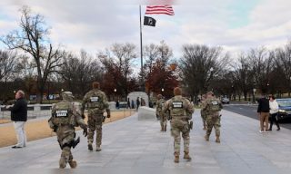 Trump halts asylum decisions, seeks Afghan refugee restrictions