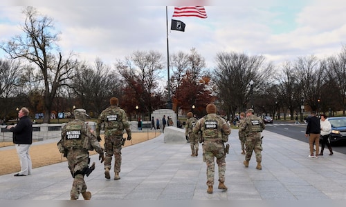 Trump halts asylum decisions, seeks Afghan refugee restrictions